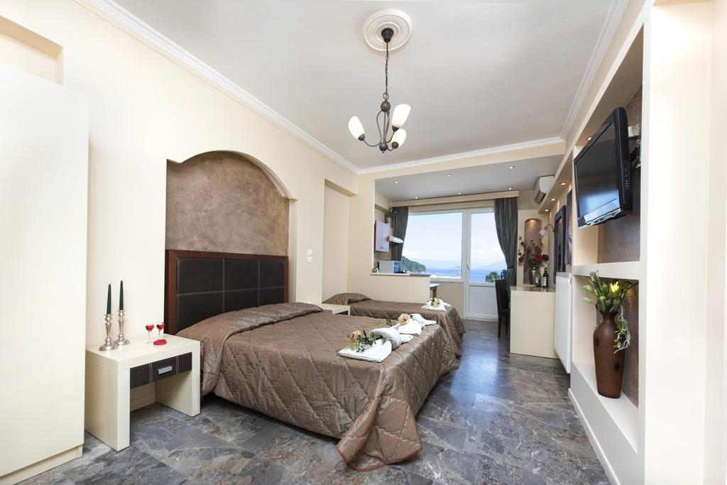 Mouse Island Aparthotel Perama  Rum bild